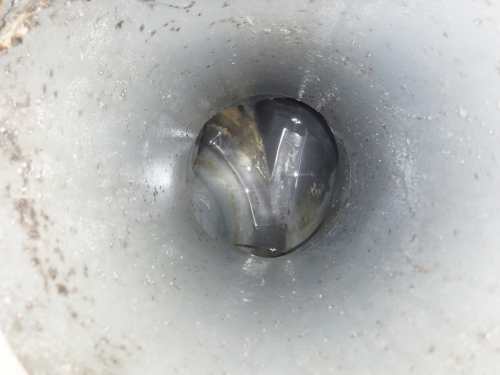 高圧洗浄機でマスを洗浄